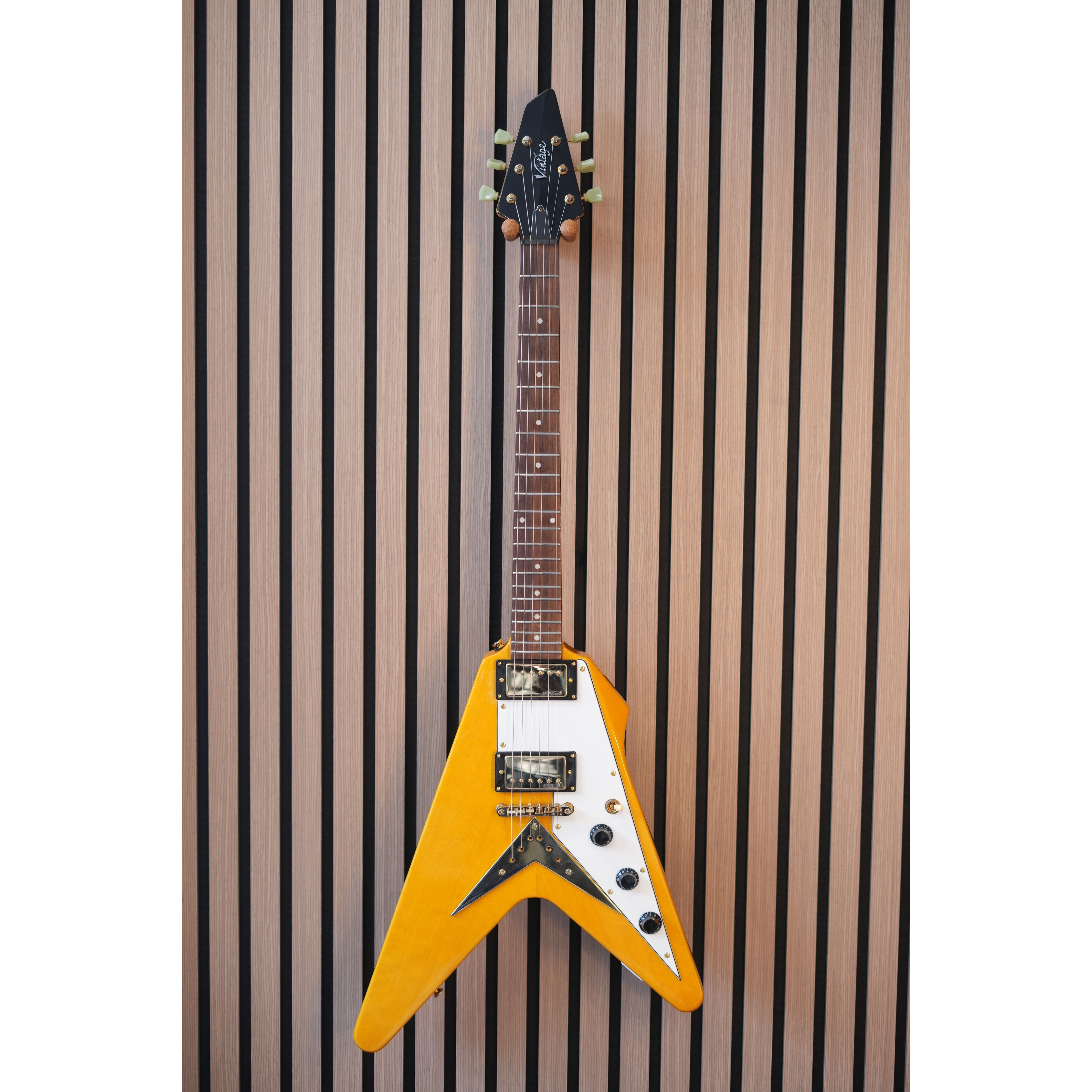 Vintage V60 "Flying V" Electric Guitar in Trans Amber Pre-Owned