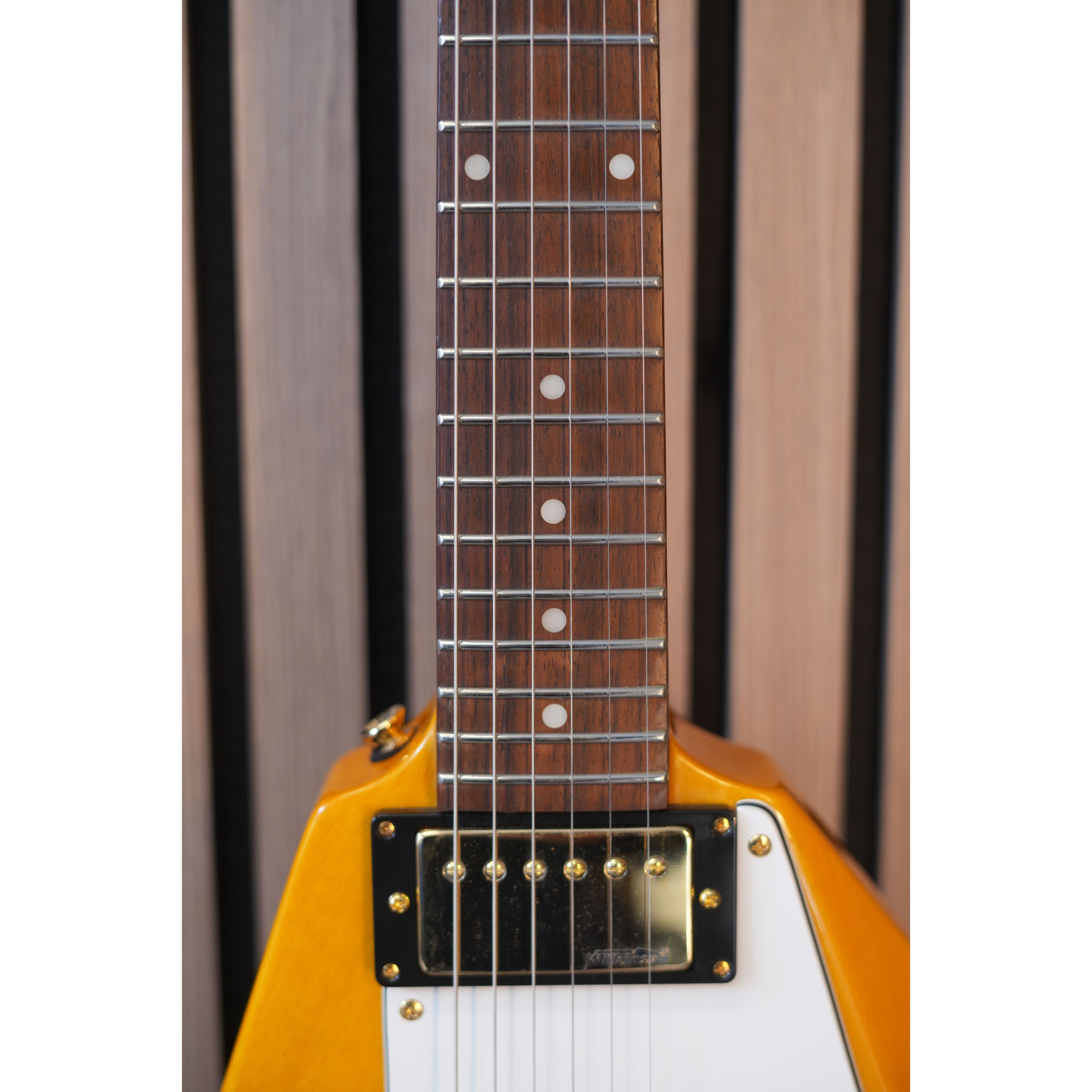 Vintage V60 "Flying V" Electric Guitar in Trans Amber Pre-Owned