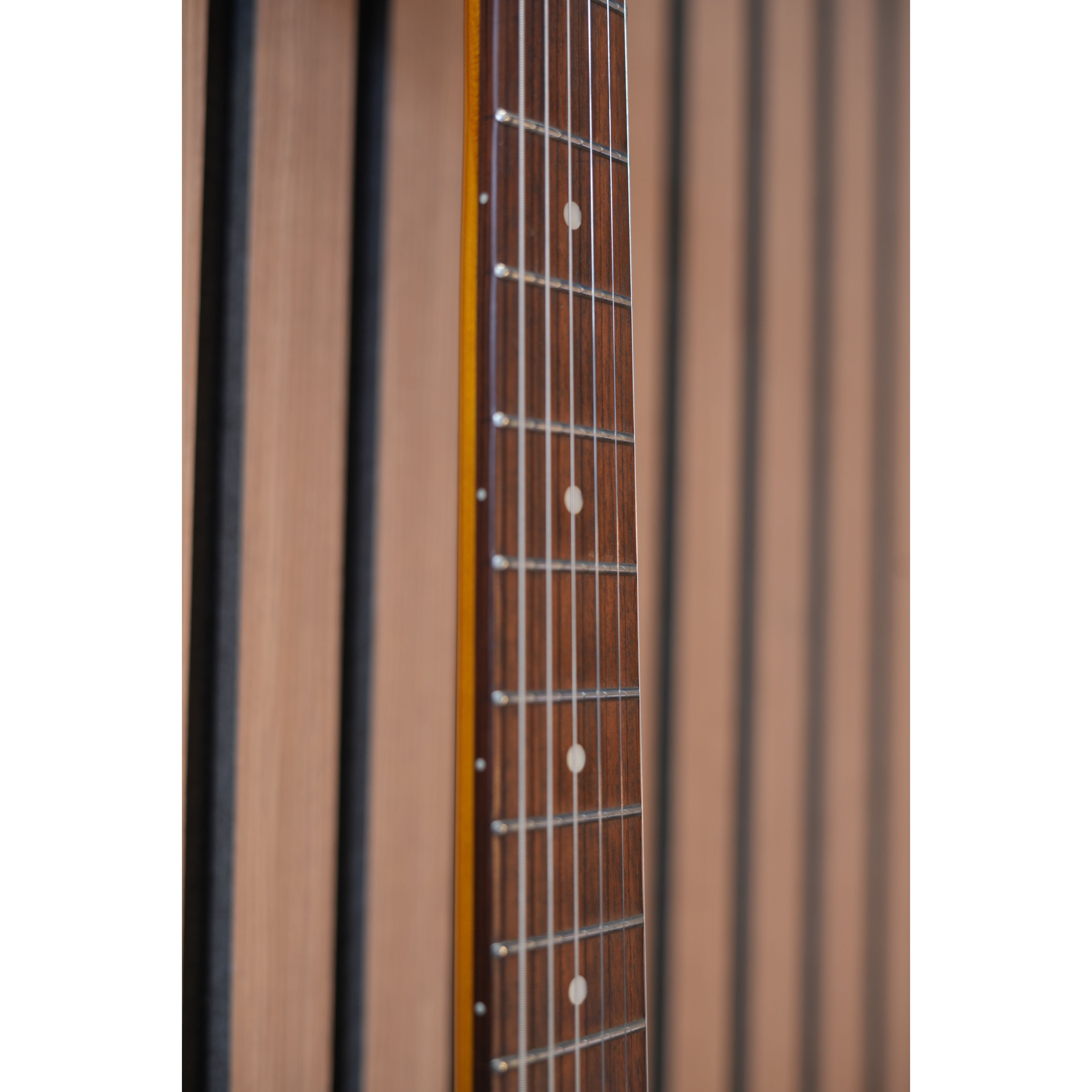 Vintage V60 "Flying V" Electric Guitar in Trans Amber Pre-Owned