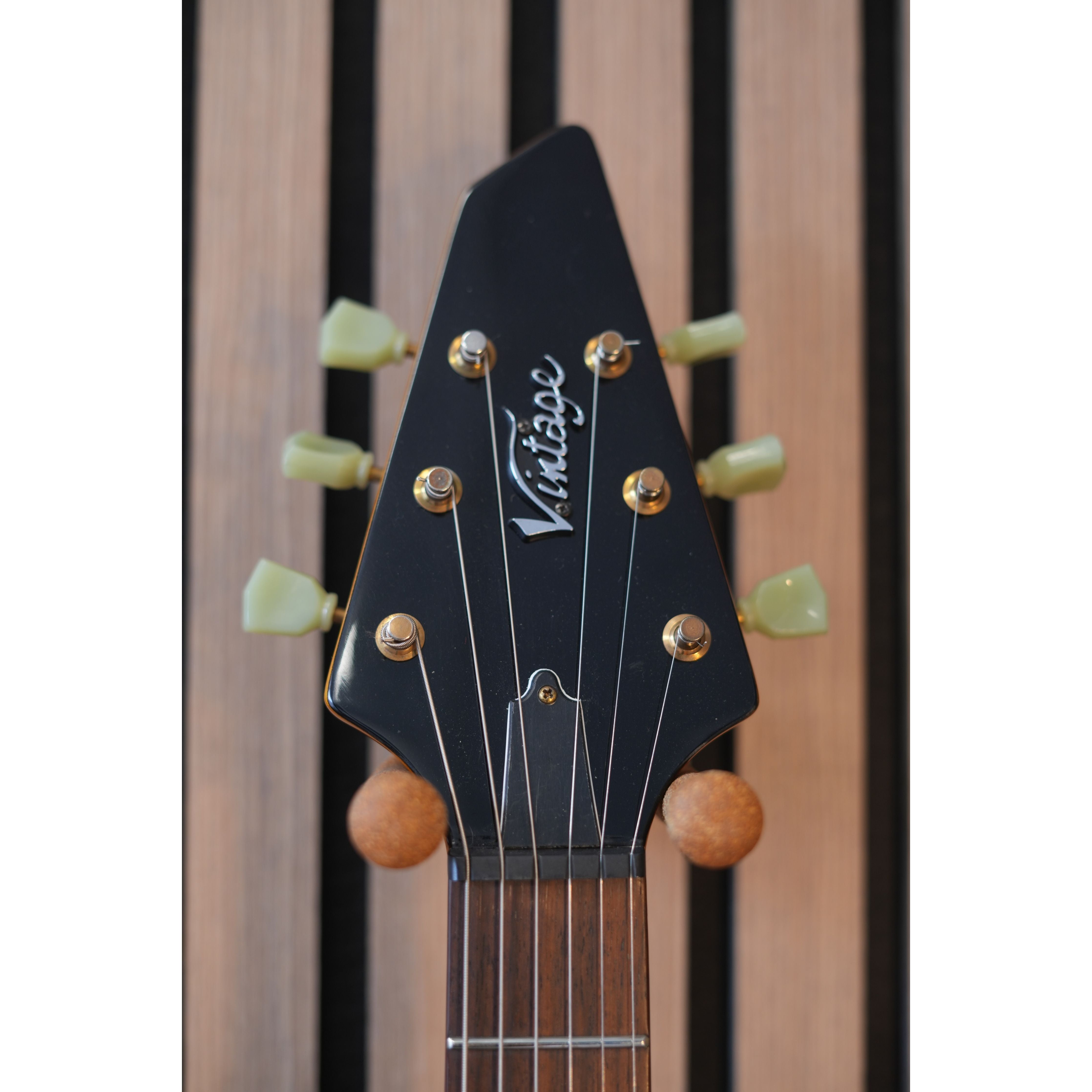 Vintage V60 "Flying V" Electric Guitar in Trans Amber Pre-Owned