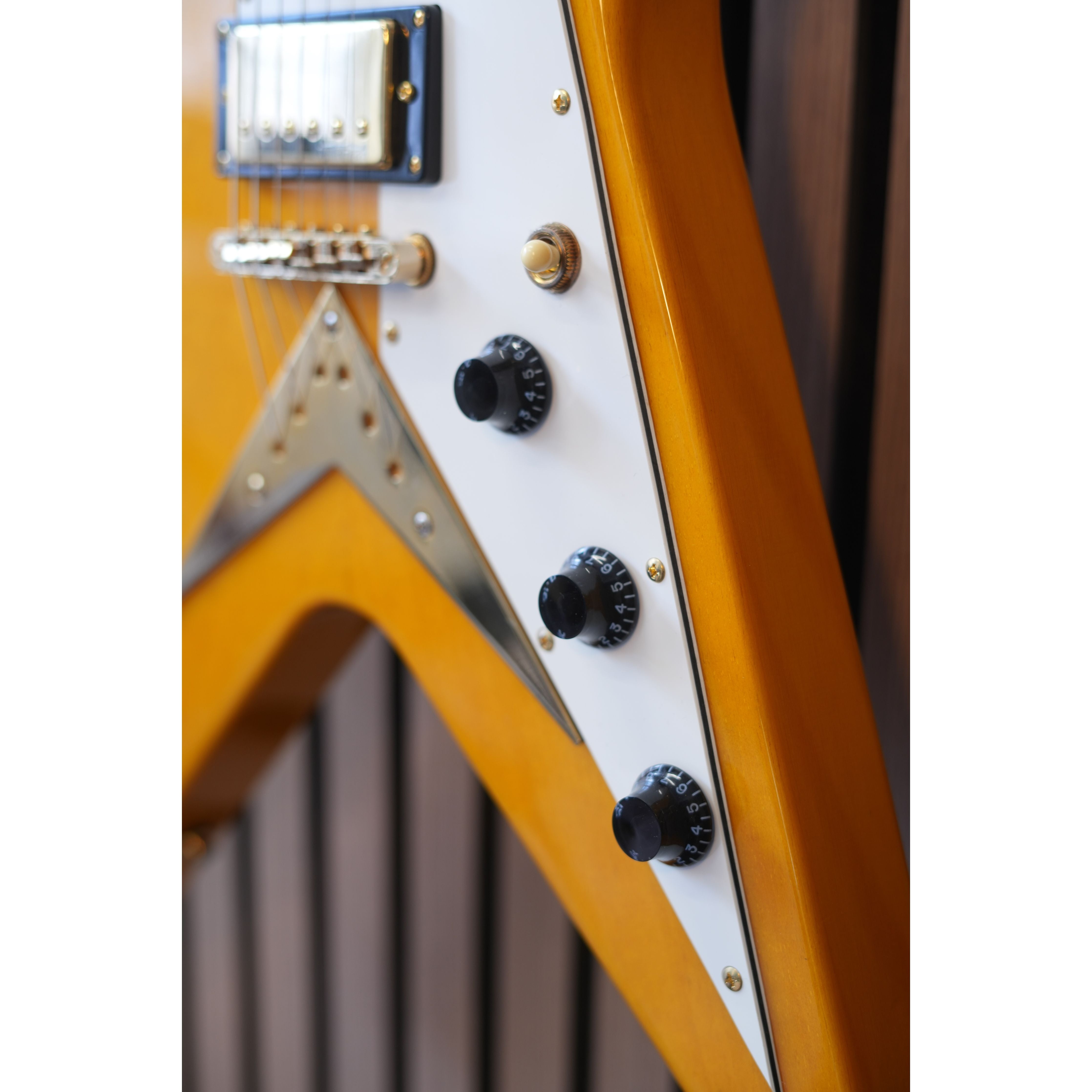 Vintage V60 "Flying V" Electric Guitar in Trans Amber Pre-Owned