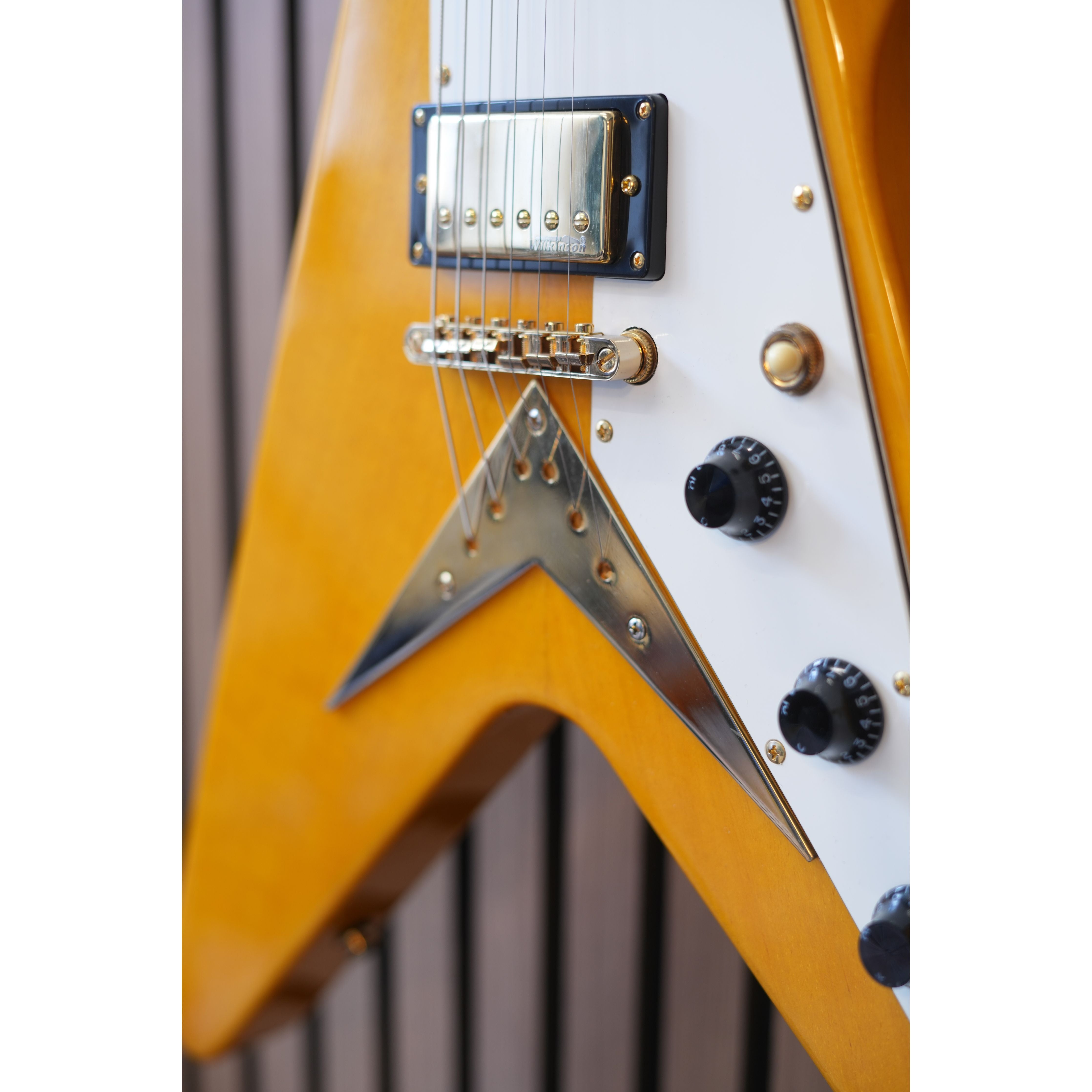 Vintage V60 "Flying V" Electric Guitar in Trans Amber Pre-Owned