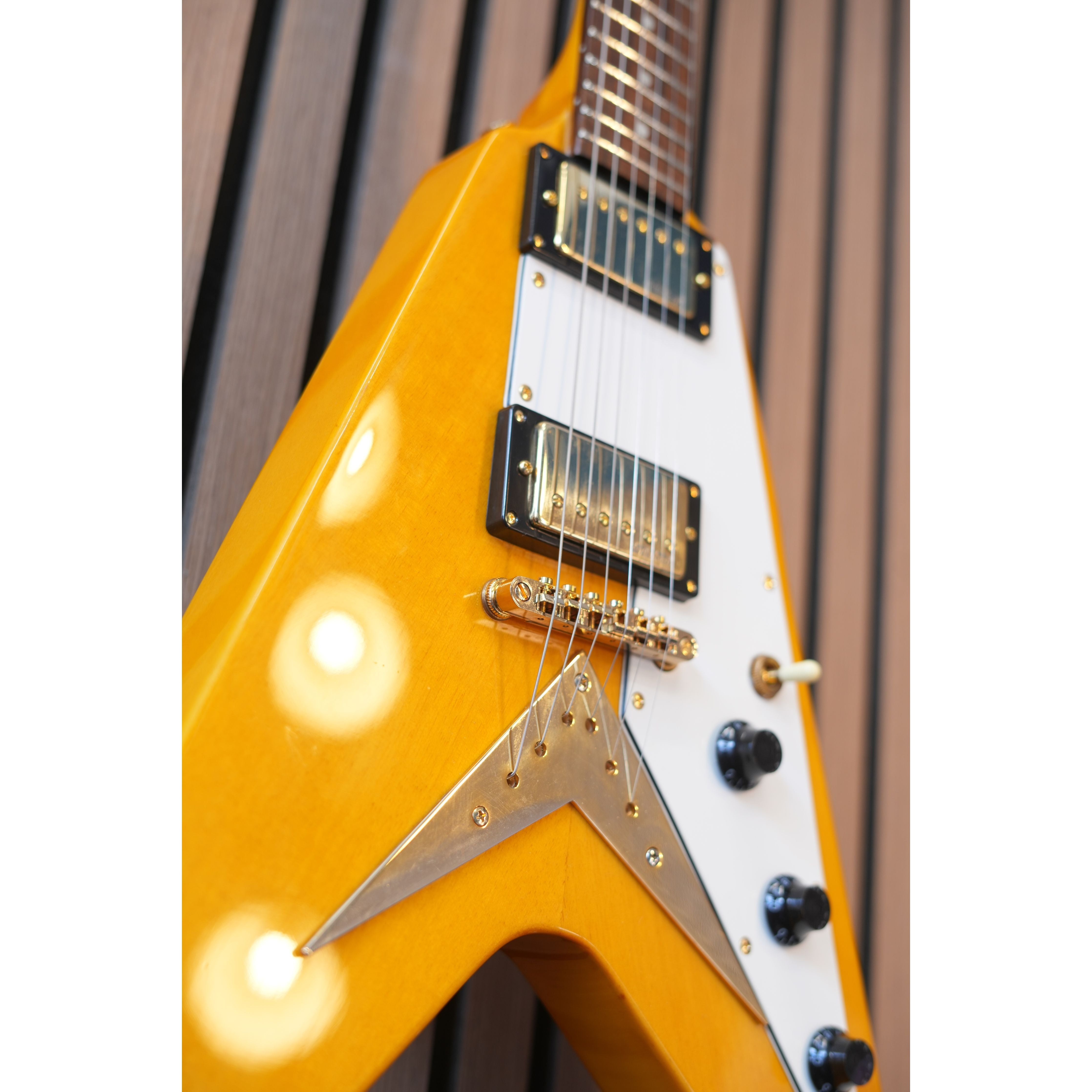 Vintage V60 "Flying V" Electric Guitar in Trans Amber Pre-Owned