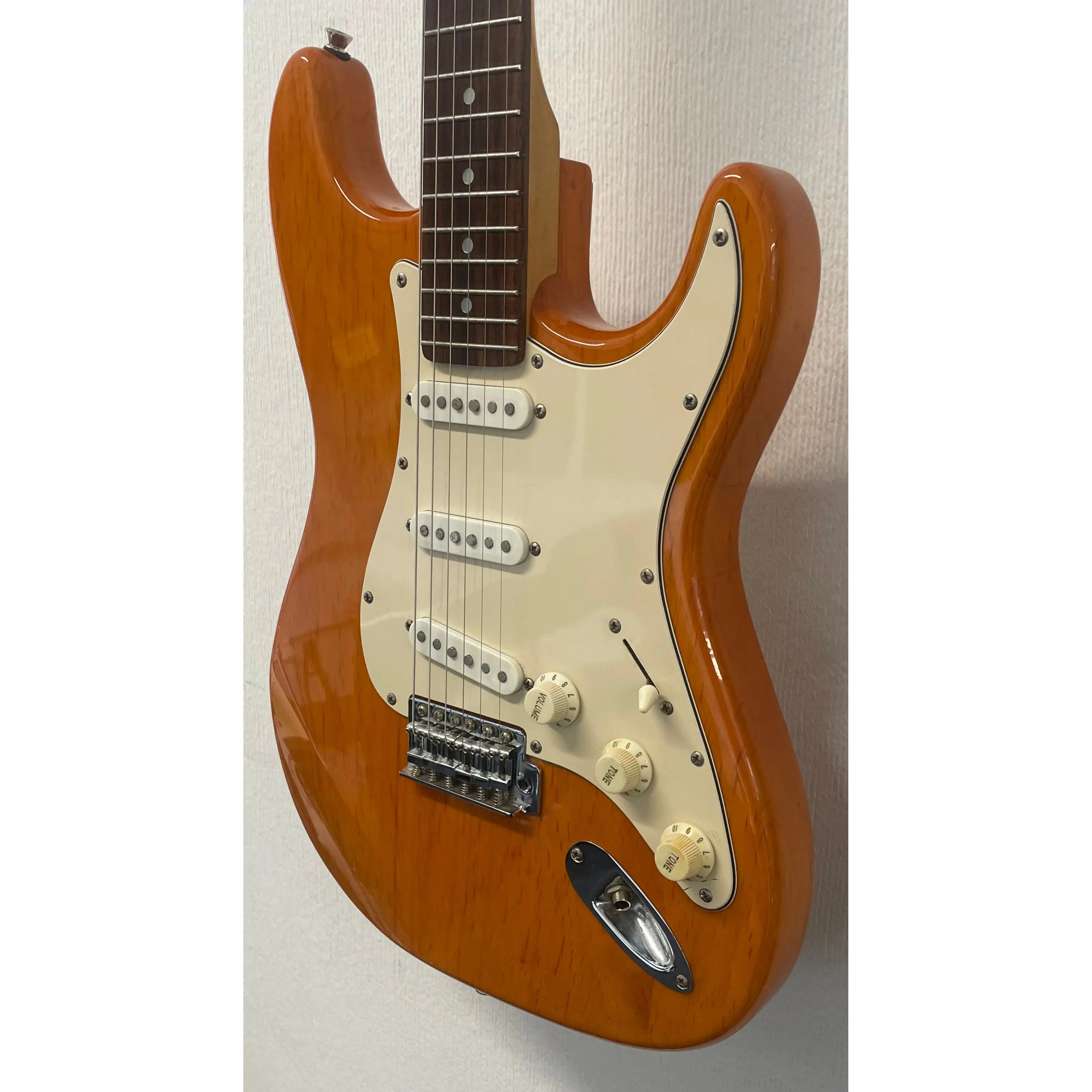 Aria STG Series Stratocaster Style Electric Guitar in Orange Pre-Owned