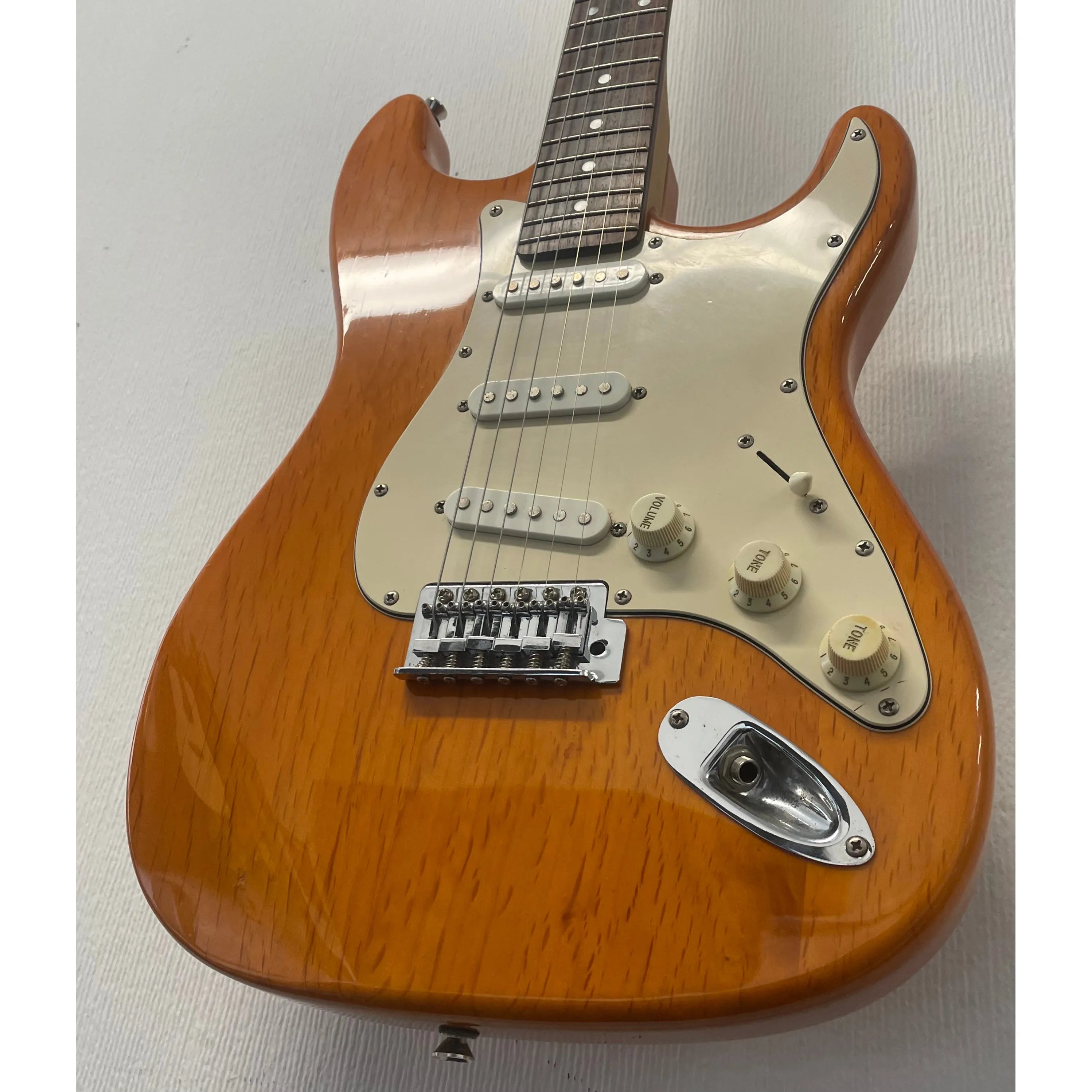 Aria STG Series Stratocaster Style Electric Guitar in Orange Pre-Owned