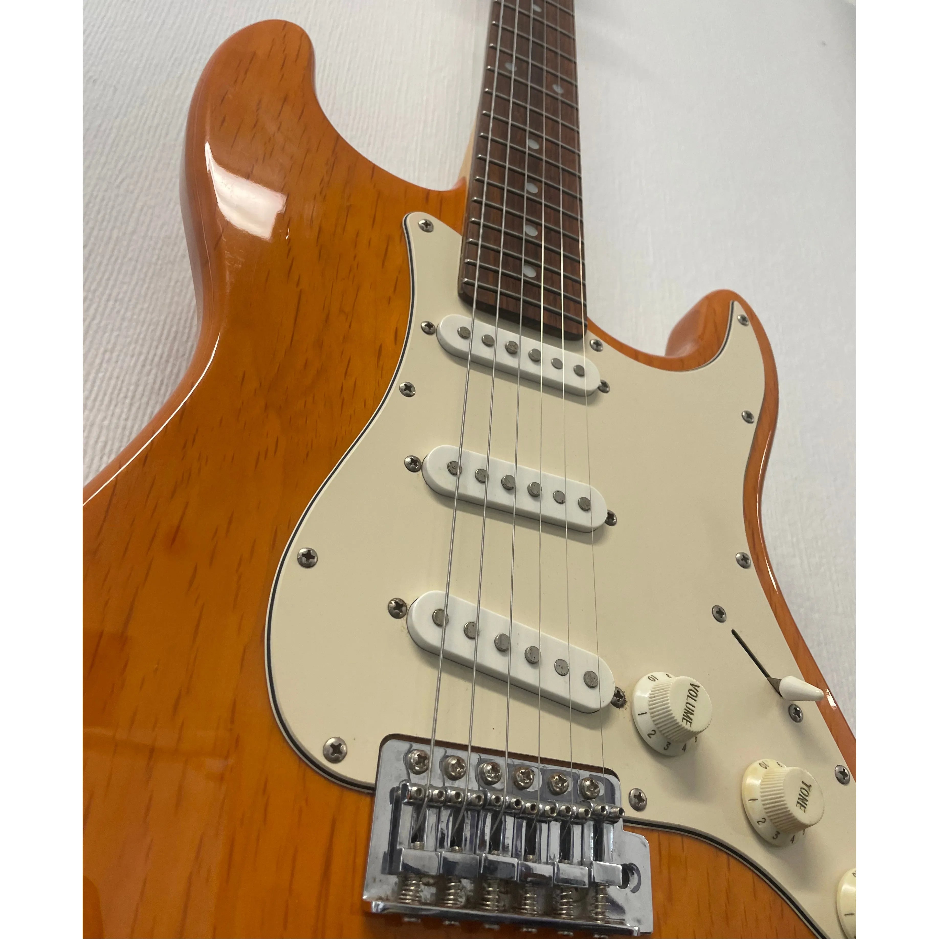 Aria STG Series Stratocaster Style Electric Guitar in Orange Pre-Owned